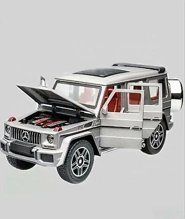 start sat: Mercedes g63 1:22 sivi metalni sa svetlecim farovima. mercedes g63 — 1