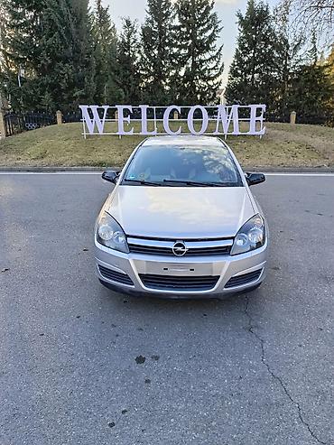 Opel: Opel Astra H – gümüşü rəng, 5 qapılı hetçbek.Hazır maşındı.ikinci — 1