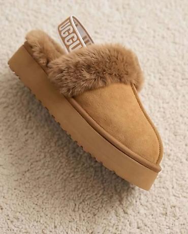 bele ugg cizme: UGG ženske papuče sa elastikom preko pete - Model: zatvorene — 1