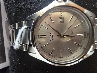dunhill satovi: Casio kvarcni ručni sat – klasični analogni model sa metalnom — 1