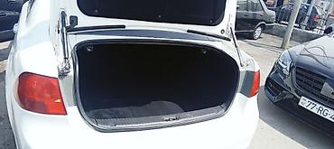 optima otracaqlar: Kia Optima sedan – ağ rəng, 4 qapı, ön‑çəkiş. 2008 ci il motor təzə — 6