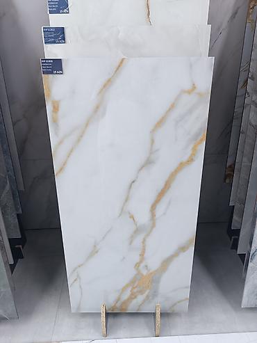 ev divar daslari: Kermoqranitlər. Kafel. Metlax.60x120 ölçüdə. Modellər çoxdur. Məhsul — 3