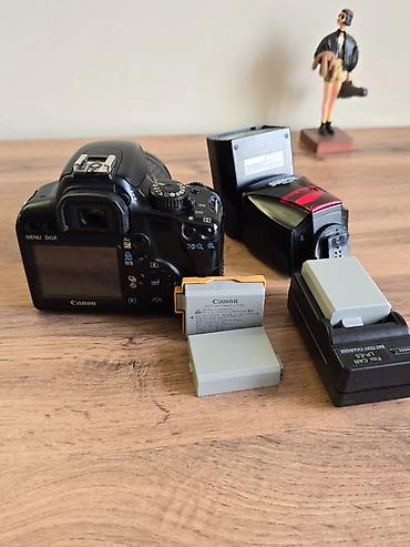 Фотоаппараттар: Зеркальный фотоаппарат Canon EOS 1000D Kit 18-55мм — отличный старт — 4