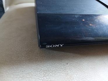 playstation icarəsi: Sony PlayStation 3 (PS3) oyun konsolu. Şəkillərdə qara rəngli PS3 — 3