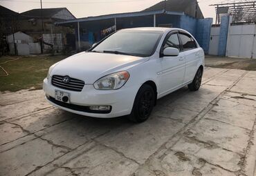 Hyundai: Hyundai Accent: 1.4 l | 2010 il Sedan — 1