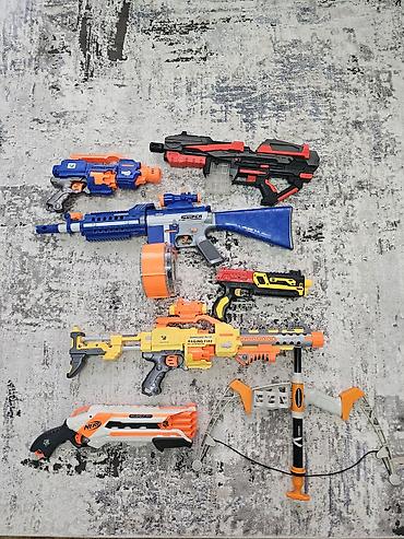 nerf бластер: Набор игрушечных бластеров и лука для стрельбы мягкими снарядами — 8