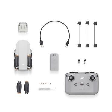фото видео услуги: DJI Mini 2 — ультралёгкий складной квадрокоптер с комплектом
