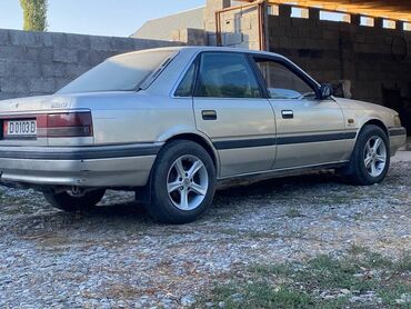 Mazda: Mazda 626: 1990 г., 1.8 л, Механика, Седан