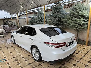 byd song plus flaship: Toyota Camry: 2020 г., 2.5 л, Автомат, Гибрид, Седан — 2