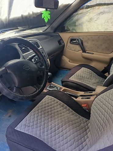 титановый: Nissan Primera: 2000 г., Автомат, Седан — 3