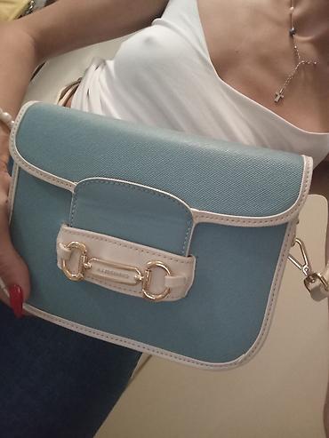 markirane torbe: Ženska crossbody torbica Alessando – svetloplava sa belim detaljima - — 1