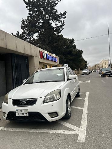 aftomobil: Kia Rio: 1.4 l | 2010 il Sedan — 1