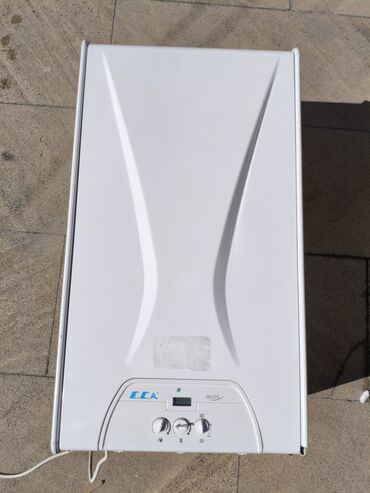 Kombilər: 1ilin kombisidir. hec bir problemi yoxdur. 1il zemanet verilir. 24Kw