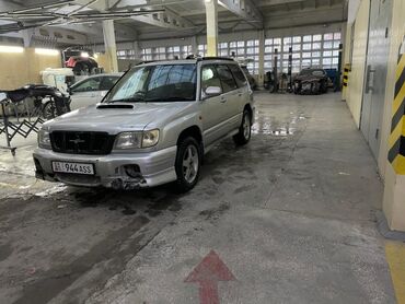 предлогайте варианты: Subaru Forester: 2001 г., 2 л, Автомат, Бензин, Кроссовер