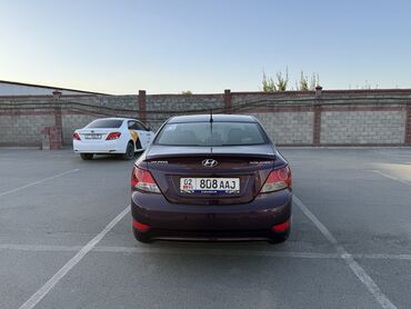 лексус ес 300 h: Автомобиль Hyundai solaris в темно-бордовом цвете, представленный в