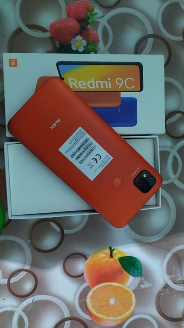 telefon satisi: Xiaomi Redmi 9C, 64 GB, rəng - Qırmızı, 
 Barmaq izi