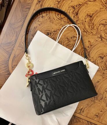 Çantalar: Michael Kors, İşlənmiş