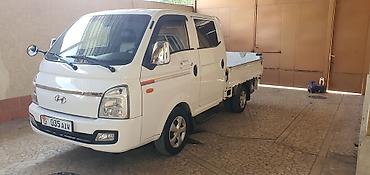 hummer h3: Hyundai Porter II, двухкабинный бортовой грузовик. Практичный — 3
