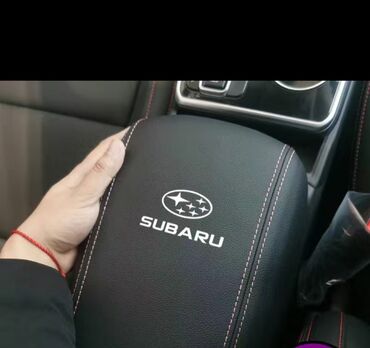 багажник на аутбек: Подлокотник Subaru, цвет - Черный, Новый