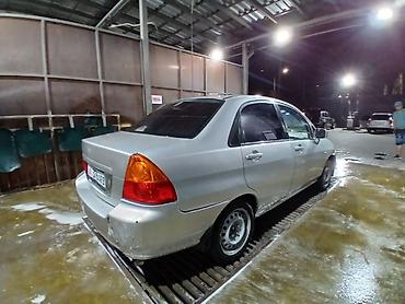 даихатсу сирион: Suzuki Liana: 2003 г. — 5