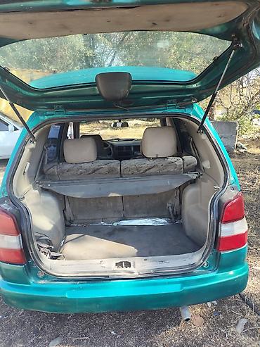 акумляторный гайкаверт: Mazda Demio: 1999 г., 1.3 л, Механика, Бензин, Хэтчбэк — 5