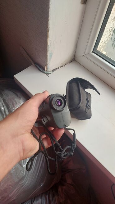 нож охотничий: Лазерный дальномер Bushnell Yardage Pro, выполненный в темно-зеленом