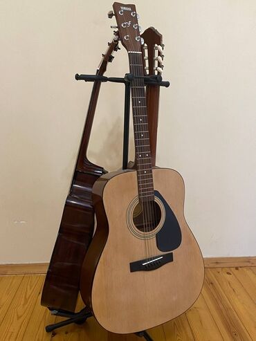 Saz: Akustik gitara, Yamaha, 6 sim, İşlənmiş