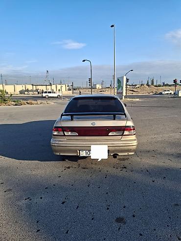 bmw e 38: Nissan Maxima: 3 l | 1999 il Sedan — 2