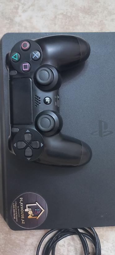 Видеоигры и приставки: Məhsul: Sony PlayStation 4 Slim (qara) Təsvir: - Orijinal PS4 Slim — 1