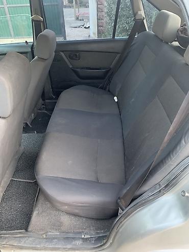 Унаа: Daewoo Nexia: 2012 г., 1.5 л, Кол менен иштөөчү, Бензин, Седан — 6