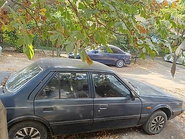 Oldsmobile: Mazda 626: 1987 г. — 2