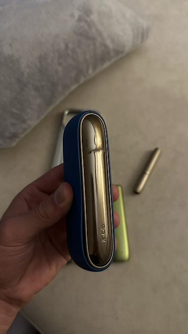 iqos case: 4 dene IQOS cihazları və aksesuarlar dəsti Tərkib: - IQOS stick-lər — 5