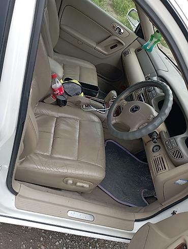 знаки: Mazda Capella: 2003 г., 2.5 л, Автомат, Бензин, Седан — 4