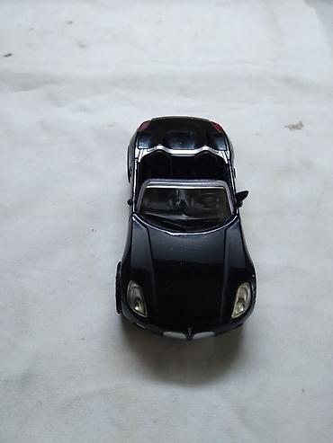 autima: New Ray Pontiac Solstice 2006., oko 1:43(9 cm.),ocuvan,China — 2