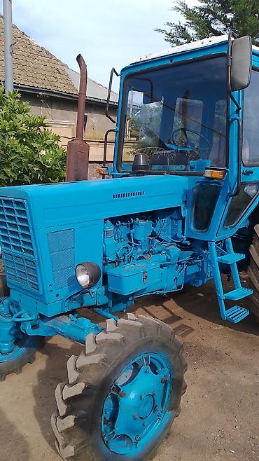 car buy: Mavi rəngdə kabinəli kənd təsərrüfatı traktoru. Xüsusiyyətlər və — 3