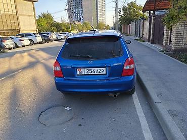 шина ош: Mazda Familia: 2002 г., 1.6 л, Кол менен иштөөчү, Бензин, Универсал — 3
