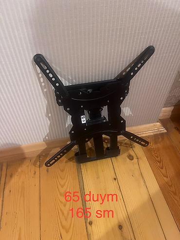tv ucuz: Televizor üçün divar kronşteyni satılır. Metal konstruksiyalı, qara — 2