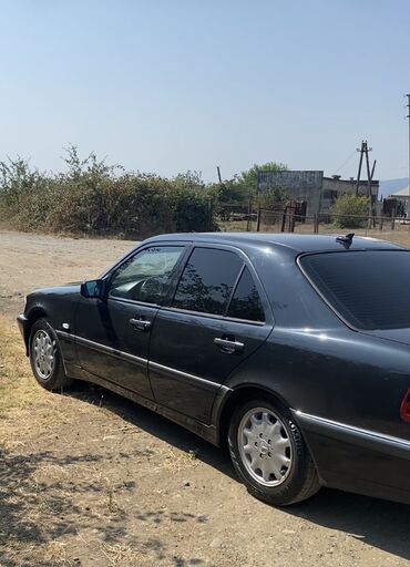 Mercedes-Benz: Mercedes-Benz E-Class: 1.8 l | 1998 il Sedan — 4