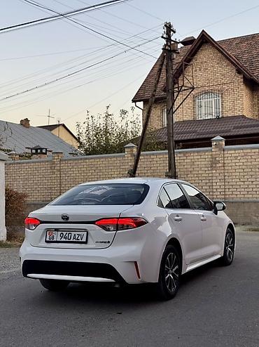 honda corolla: Toyota Corolla: 2022 г., 1.8 л, Вариатор, Гибрид, Седан — 5