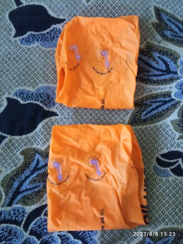 оранжевая сумка: Нарукавники 100 сом