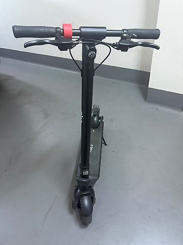 elektrikli scooter toba: Elektrikli skuter – Toba - Rəng: qara, yığcam və minimal dizayn - — 1