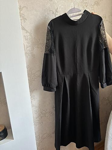 Qara rəngdə zərif qadın donu - Model: midi uzunluqda, yüngül A-kəsim