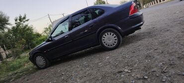авто купить бу: Tünd göy rəngdə olan Opel Vectra sedanı. Bu avtomobil rahat və