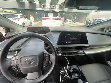 124 2 2: Toyota Prius: 2023 г., 2 л, Автомат, Гибрид, Хэтчбэк — 6