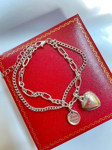 Narukvice: Narukvica sa privescima žig 925
Cena:1000din — 5