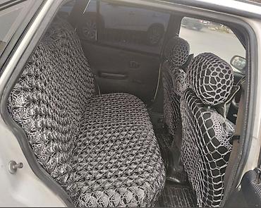 Daewoo: Daewoo Nexia sedan - Kuzov: 4 qapılı sedan, ağ rəng, qara bamper və — 11