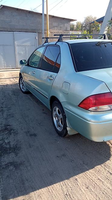 Mitsubishi: Mitsubishi Lancer: 2000 г., 1.5 л, Автомат, Бензин, Седан — 5