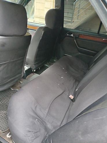 hyundai 2002 accent: Mercedes-Benz E 200: 2 l | 1990 il Sedan — 6