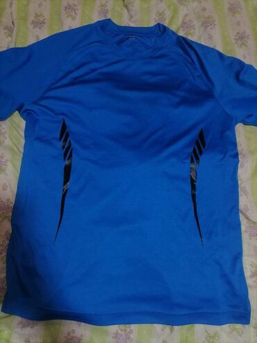 Sportska odeća: Na prodaju plavi dres u M veličini, praktično nov
