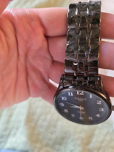 Tissot Le Locle kişi qol saatı.Sadece karobkasi yoxdu.Ozu yenidir.Real